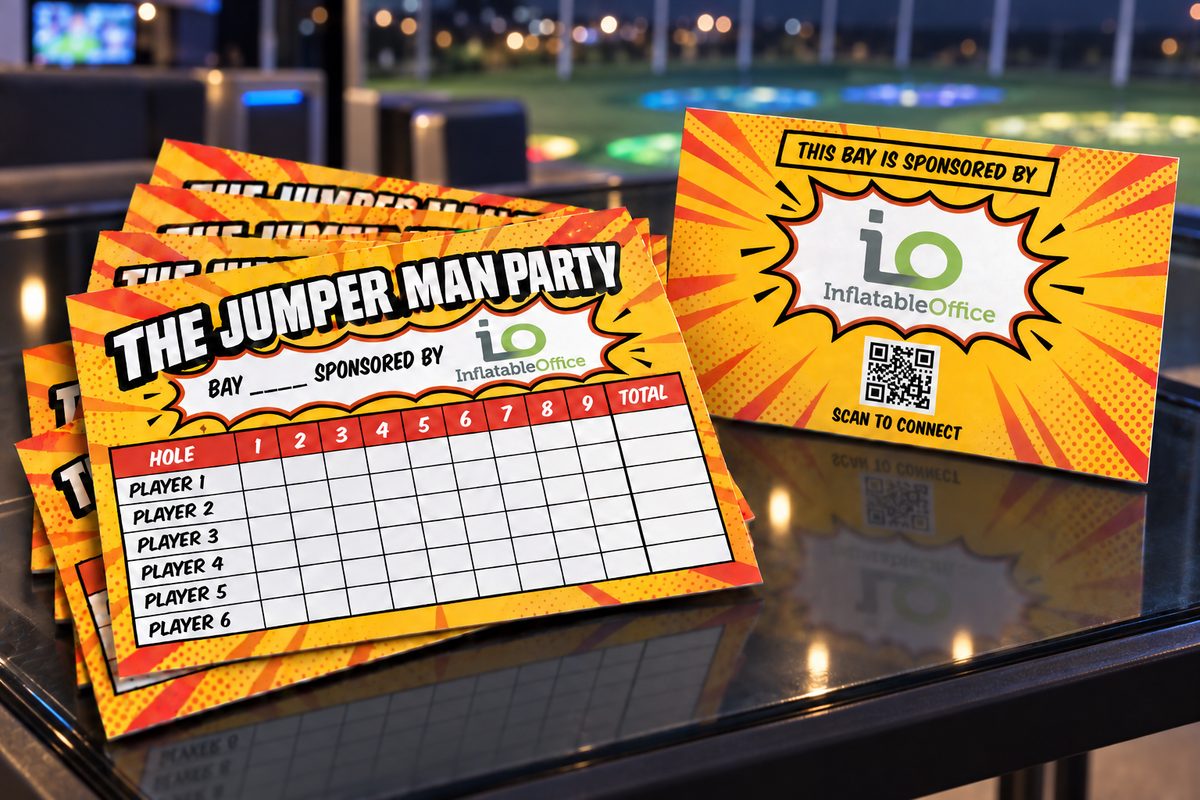 Mini-golf scorecards and a bay sign printed with the Inflatable Office logo